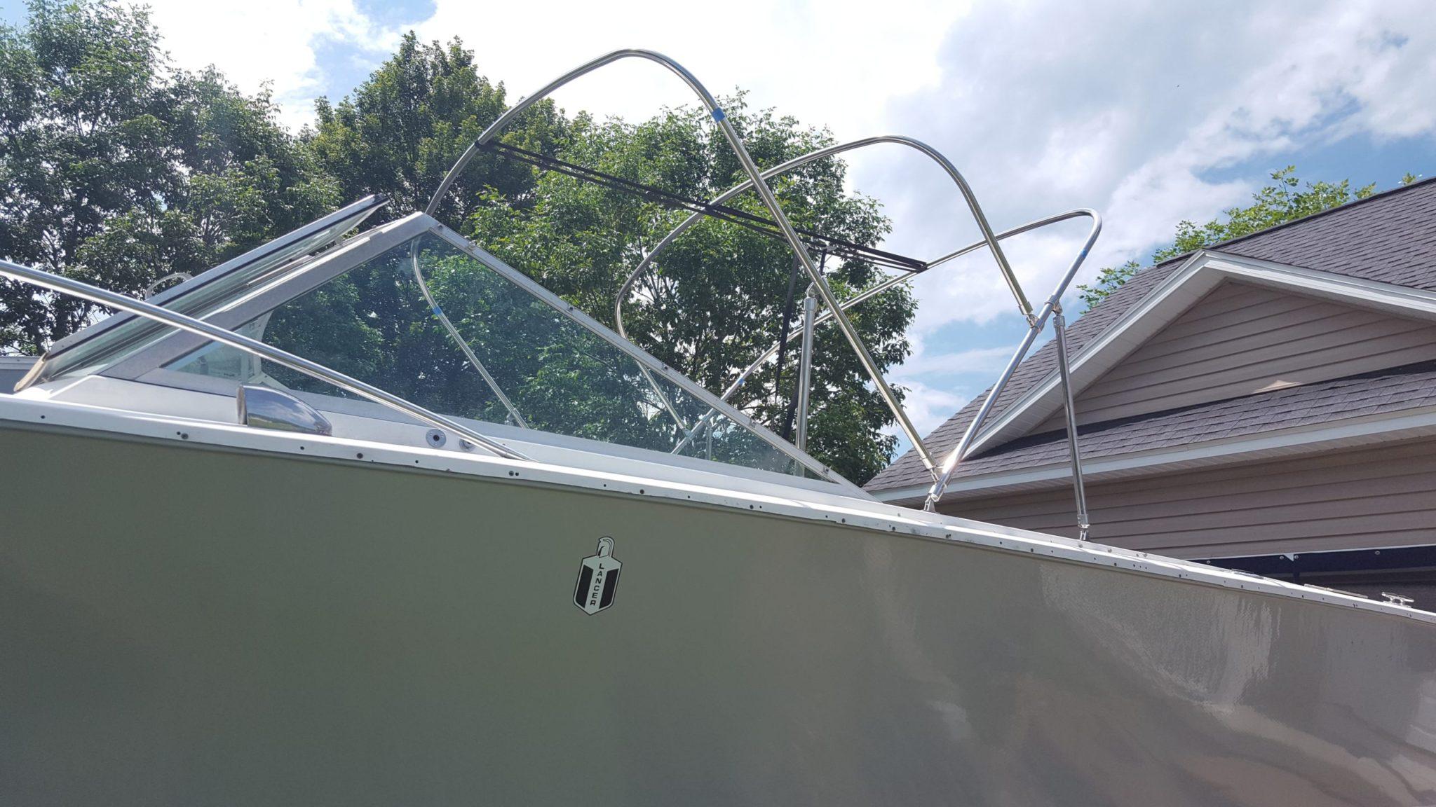 Bimini tops and enclosures custom fabricated bimini with enclosure panels
